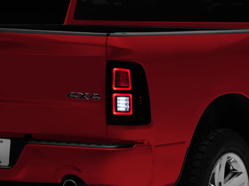 Raxiom 09-18 Dodge RAM 1500 LED Tail Lights- Black Housing (Smoked Lens).