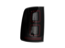 Load image into Gallery viewer, Raxiom 09-18 Dodge RAM 1500 LED Tail Lights- Black Housing (Smoked Lens).