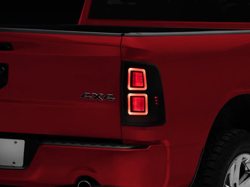 Raxiom 09-18 Dodge RAM 1500 LED Tail Lights- Black Housing (Smoked Lens).